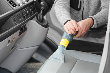 car dry cleaning. Light gray textile seats chemical cleaning with professionally extraction method. regular clean up