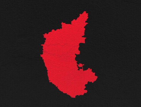 Karnataka red map on isolated black textured background. High quality coloured map of Karnataka, India.
