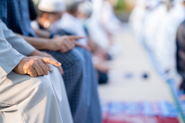 Many Muslims, children, women, and men pray and celebrate Eid al-Fitr which marks the end of the month of Ramadan, they are happy, in Thailand.