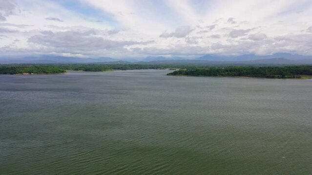 Paoay Lake. Lake on the island of Luzon, aerial view. Natural pond with green water. Summer and travel vacation concept.