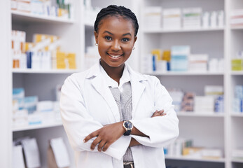 Pharmacy, pharmacist or portrait of black woman with arms crossed or smile in healthcare drugstore...