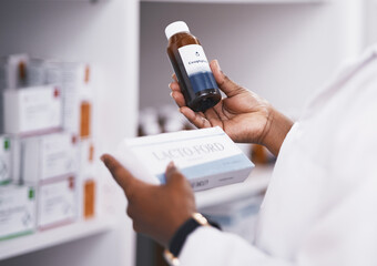 Doctor, medicine or hands of person with pills or supplements bottle in drugstore for healthcare inventory. Zoom, clinic or nurse checking or reading info on medical products or tablets in pharmacy