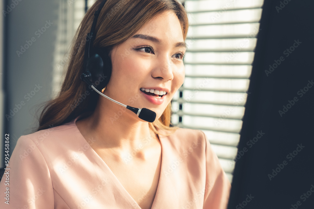 Aufkleber competent female operator working on computer and while talking with clients. concept relevant to bo