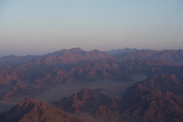 Aerial view from window plane of  mountains in Egypt.