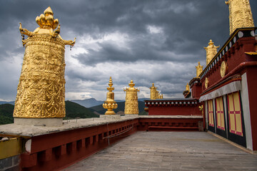 The roof architecture of Songzanlin Temple also known as the Ganden Sumtseling Monastery, is a...