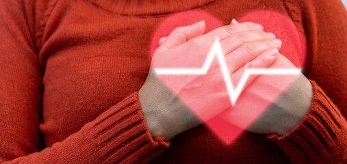 Hand holding red heart and sign cardiogram, health and medical, heart health,  heart attack, world heart day, cardiovascular disease, doctor, treatmen.insurance and hospital concept