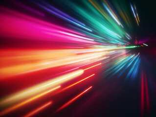 A colorful light display with a blurry image of a light trail.
