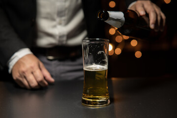 Barman pouring whiskey whiskey glass beautiful night