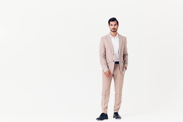 Fototapeta premium man standing smiling suit winner victory businessman beige business running happy