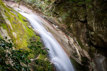 Beautiful and serene waterfall at Jakuchi Gorge, Goryu Falls, 7 falls hike in Iwakuni, Yamaguchi prefecture, Japan.