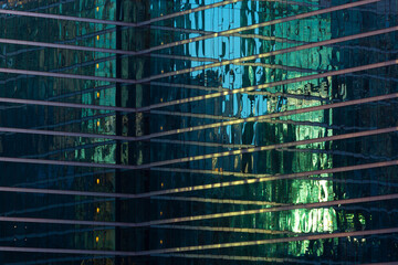 Reflections in a glass facade in downtown Chicago. © Cavan