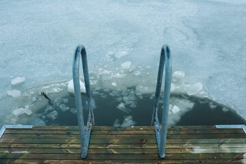 cold water swimming spot in the frozen Baltic Sea in Scandinavia