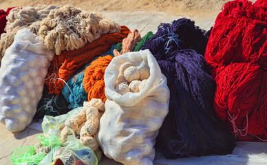 Balls of  sheep and camel wool.  Turkmenistan. Ashkhabad market. - 595476423