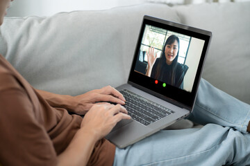 VDO Call Conference Man work from home. talk chat online on video call on laptop webcam...