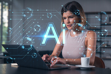 Thoughtful businesswoman in casual wear typing on laptop at office workplace with coffee cup. Concept of distant work, business education, internet surfing, information technology. Ai hologram