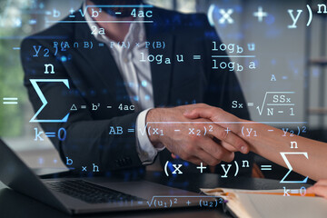 Businesspeople shake hands on great deal at office workplace. Concept of team work, business agreement, partnership, project success. Handshake shot. Education hologram