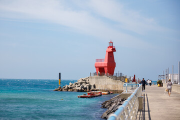 Wonderful Iho Tewoo Beach two horse shaped lighthouses. Jeju Island, South Korea