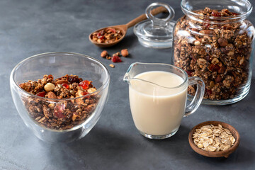 Homemade granola with oat milk. The concept of proper nutrition. Healthy vegan breakfast.