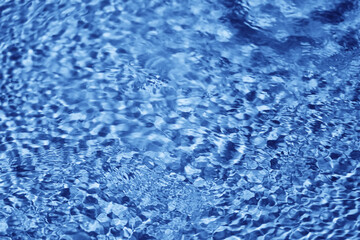 texture of transparent clear water in the pool blue abstract background