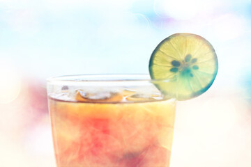 iced tea with ice and lemon at the beach bar