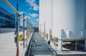 Liquid nitrogen tanks and heat exchanger coils for producing industrial gas
