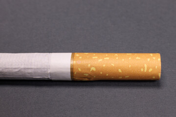 Cigarette on a gray background