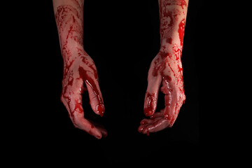 bloody hands on a black background, the concept of self-defense, murder, nightmares, halloween - obrazy, fototapety, plakaty