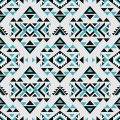 Aztec style blue seamless geometry pattern with tribal ornament. Ornamental ethnic background collection. Use for fabric prints, surface textures, cloth design, wrapping. 