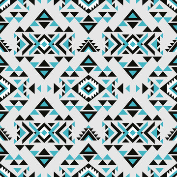 Aztec style blue seamless geometry pattern with tribal ornament. Ornamental ethnic background collection. Use for fabric prints, surface textures, cloth design, wrapping. 