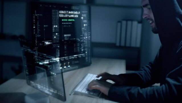 Futuristic Anonymous hacker trying to breached cybersecurity by using algorithm source code to exploit weakness in password security. Concept : Cyber Hacker -  Access granted