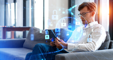 Serious man with tablet and data protection interface