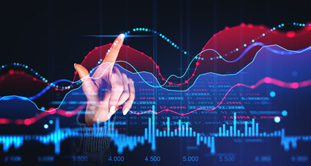 Woman finger touch forex diagrams and stock market data with lines