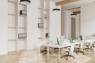 White open space office with bookshelves