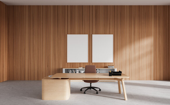 Light wooden CEO office with posters