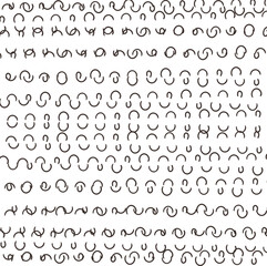 The pattern consists of small squiggles or semicircular lines.