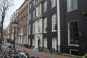 Fototapeta premium old brick houses and palaces (?) in amsterdam (the netherlands) 