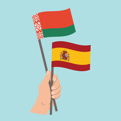 Flags of Belarus and Spain, Hand Holding flags