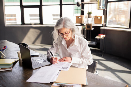 Human Resources Manager Lady Reading CV Selecting Employees In Office