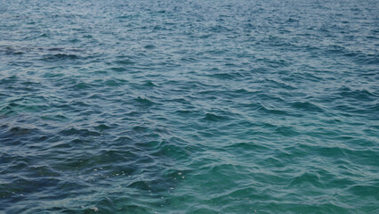 Obraz premium Closeup mediterranean sea background with beautiful azure color
