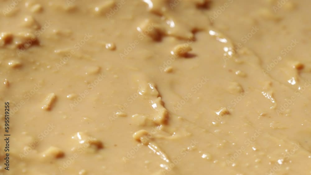Poster peanut butter close-up rotates in a circle