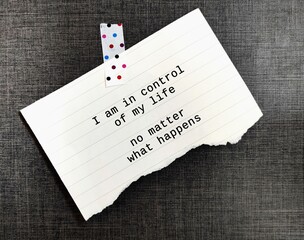 Handwritten stick note - I am in control of my life no matter what happens - positive self talk to...