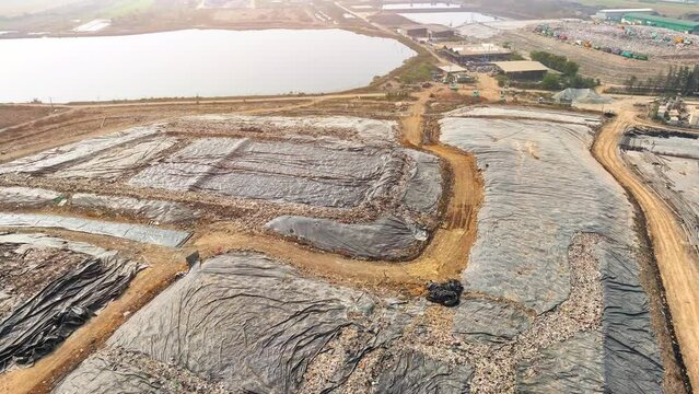 Landfills can contribute to pollution by releasing harmful chemicals and gases into the air and water. These can include methane, carbon dioxide, which can contaminate nearby soil and water sources.
