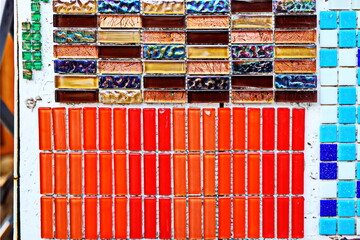 A close-up view of ceramic tile and small brick used for facing wall and houses. Abstract...
