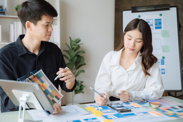 Creative team web designer planning application development for web mobile phone at modern...