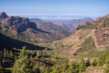 Fototapeta na wymiar View from Roque Nublo over small village in a valley of Gran Canaria