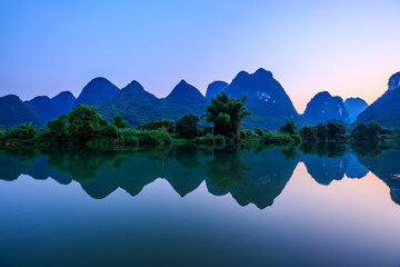 Landscape of Guilin. Li River and Karst mountains at sunset in Guilin, Guangxi, China.