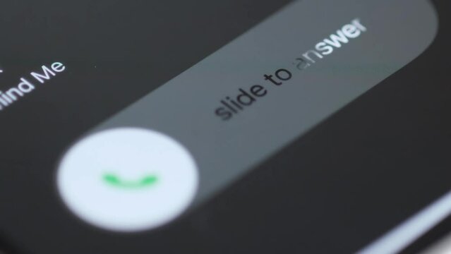 Incoming call on smartphone macro video. Answering an incoming call to the phone