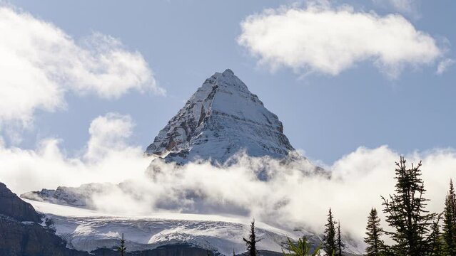 Time lapse of Beautiful Mount Assiniboine with cloud blowing and blue sky in provincial park at BC, Canada