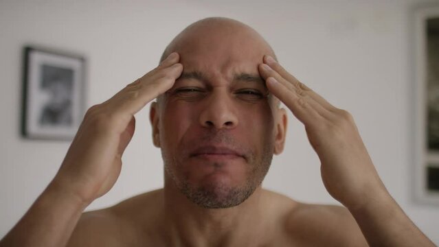 POV of angry and verbally abusive male shouting to camera, in slow motion