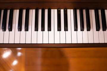 Close-up of black and white piano keys shot from above
